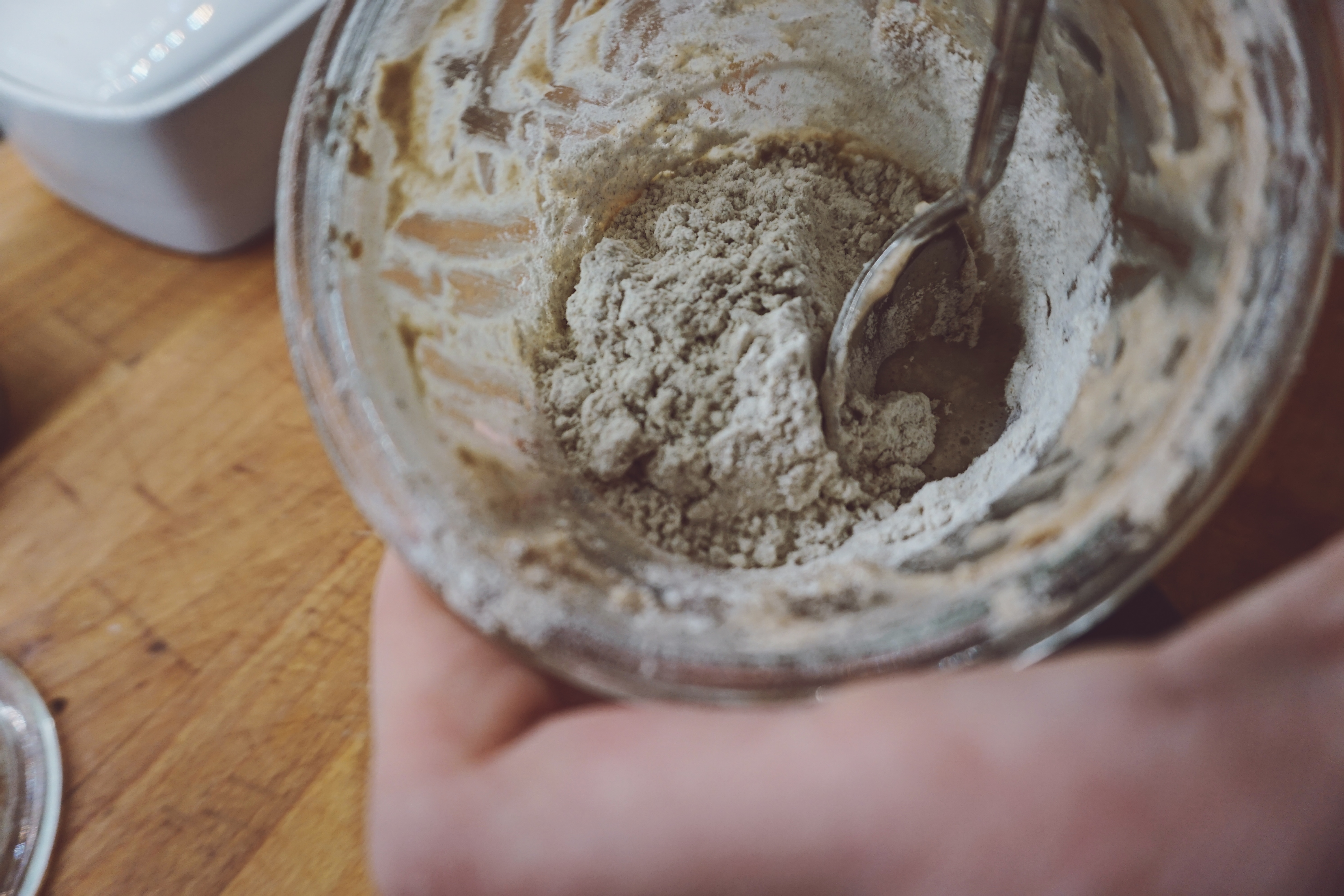 young women sitting on a chair in male clothes