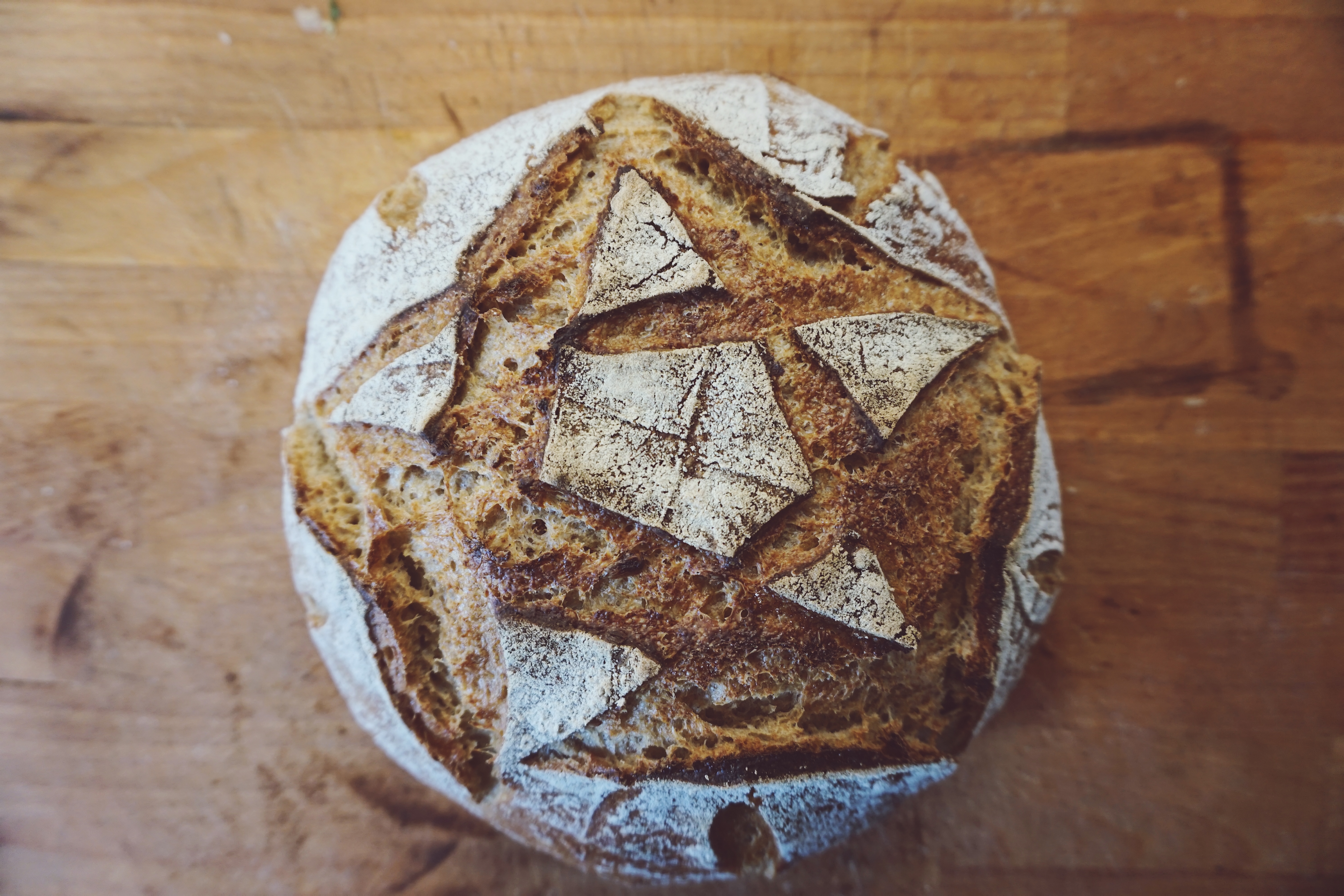 young women sitting on a chair in male clothes